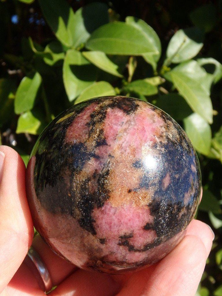 Cranberry Pink & Bold Black Rhodonite Sphere - Earth Family Crystals